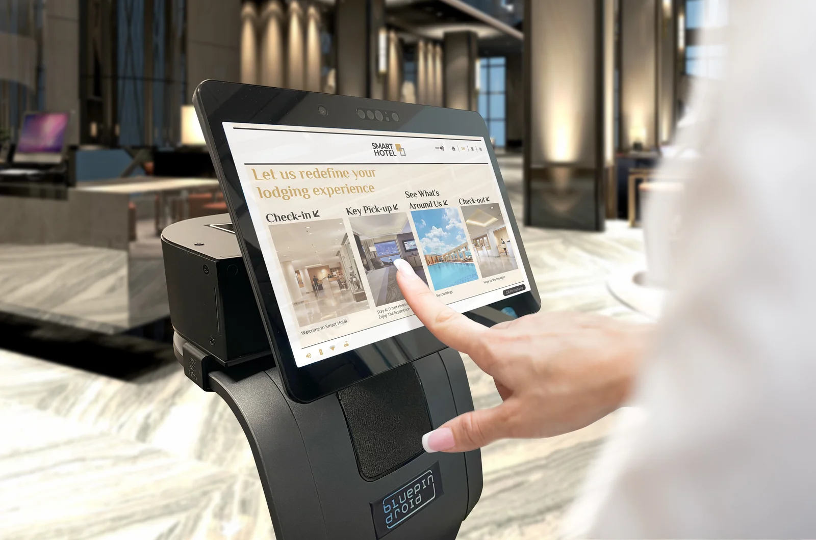 A guest uses Bluepin’s hotel self-service touchscreen